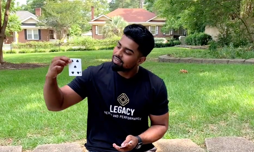 man holding cards from deck