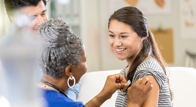 Girl getting a vaccine