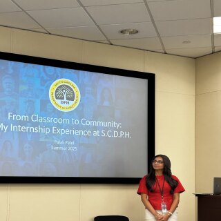 Palak Patel presenting a DPH Powerpoint