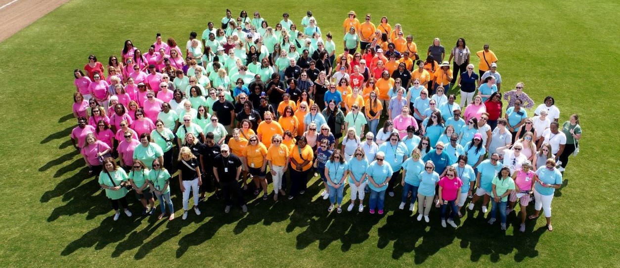 Drone overhead photo of DHEC nurses in varying tee shirt colors