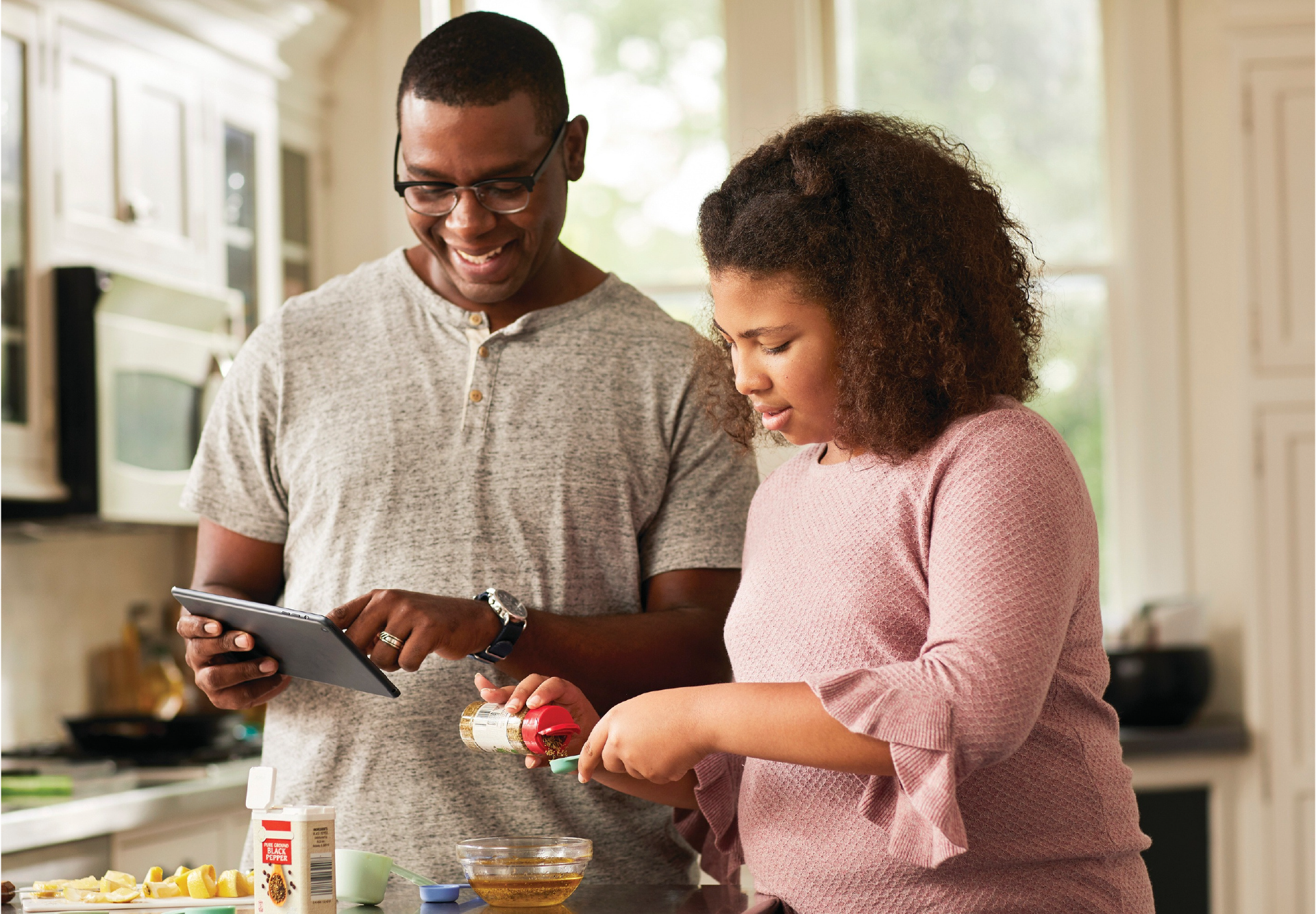 dad and daughter cooking