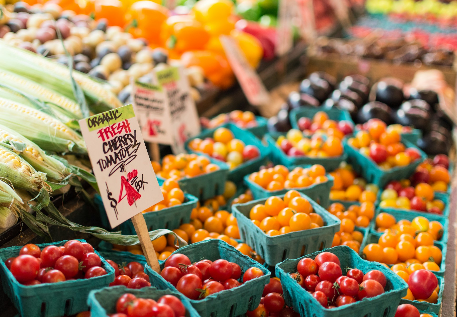 table with fruits and vegetables for sale at farmers' market