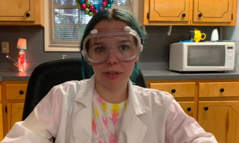 woman wearing science goggles